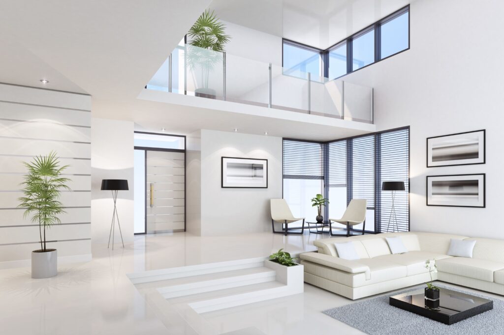 Bright modern living room with large windows and minimalist decor.